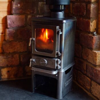 Hobbit small wood burning stove installed cabin - hotboxstoves.co.uk