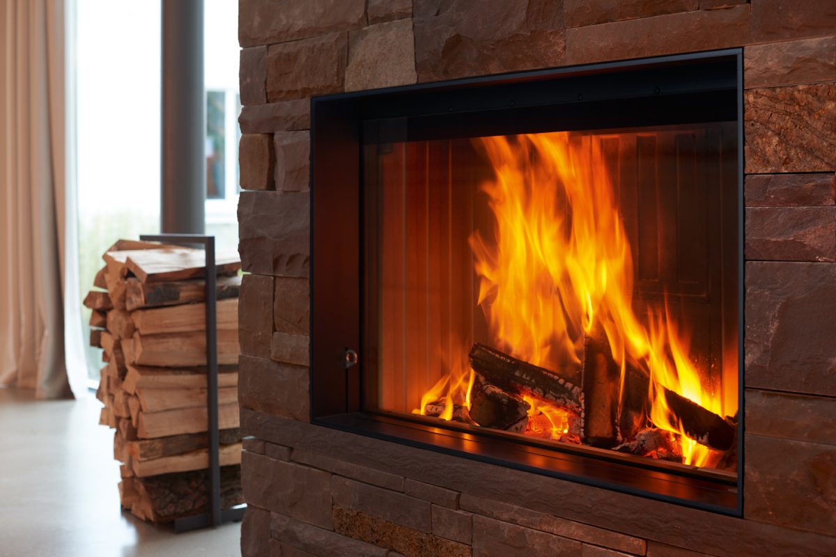 quality stoves online, Spartherm moder inset stove set into a wall in a contemporary setting.