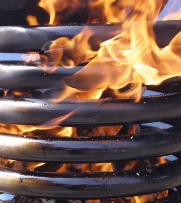 coil on a wood fired hot tubs, warming water into the tub through thermal cycling