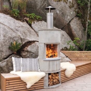 Nordpeis Roma outdoor fireplace lifestyle side - hotboxstoves.co.uk