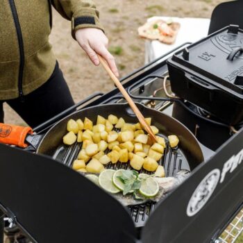 Petromax cast iron grill skillet with a pan handle lifestyle image - hotboxstoves.co.uk