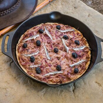 Petromax cast iron skillet with two handles lifestyle image - hotboxstoves.co.uk