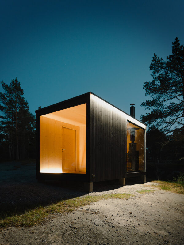 Tyyni 10 sauna cabin surrounded by forest - hotboxstoves.co.uk