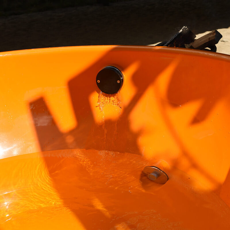 Dutchtub original orange water filling the tub - hotboxstoves.co.uk